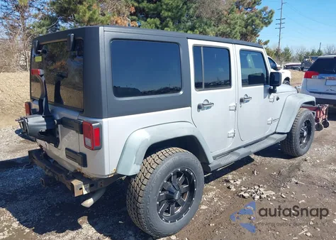 2011 Jeep Wrangler Unlimited Sport z USA, uszkodzony, nr VIN 1J4BA3H14BL575380